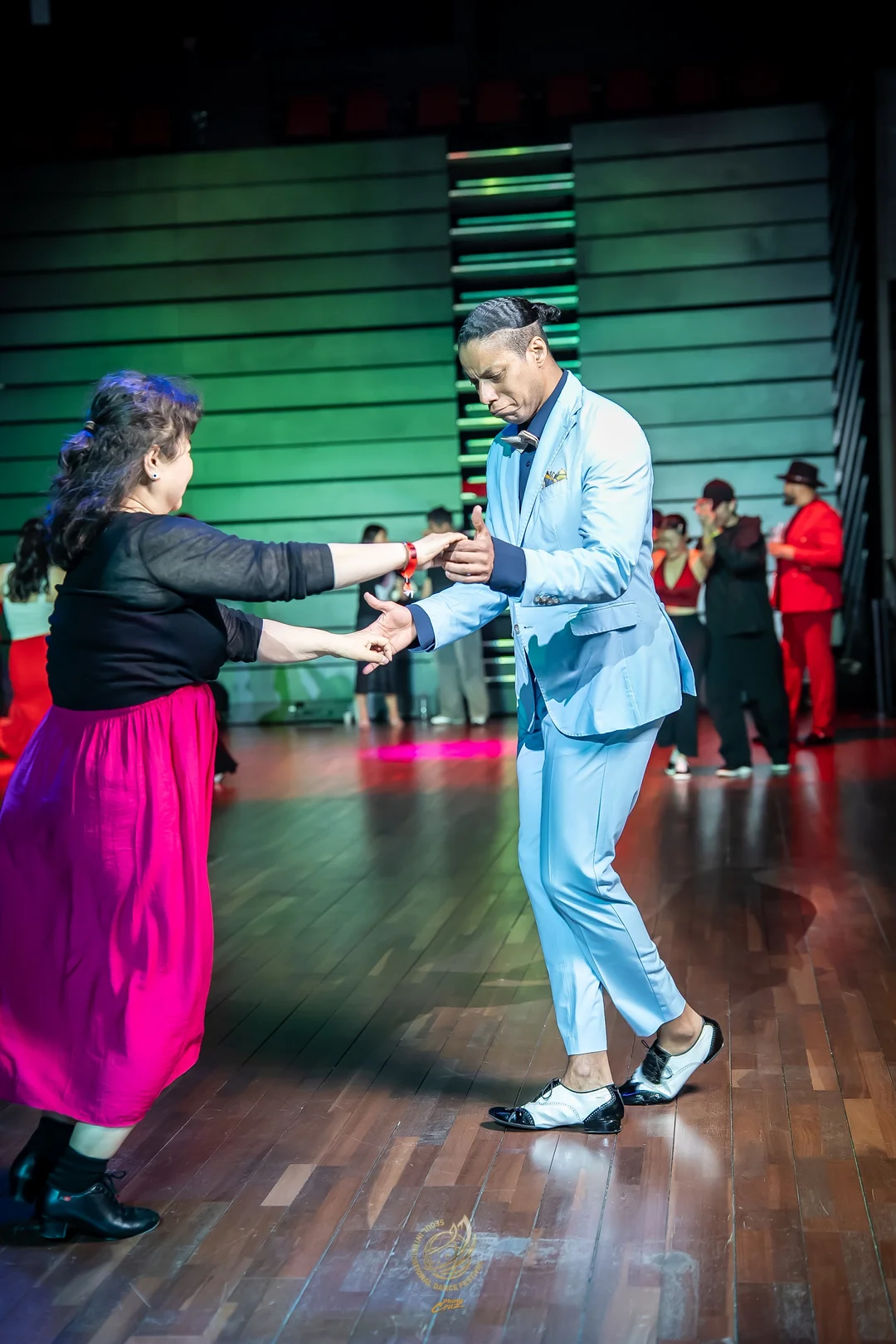 Participants dancing to music during SIDF 2026 Friday social