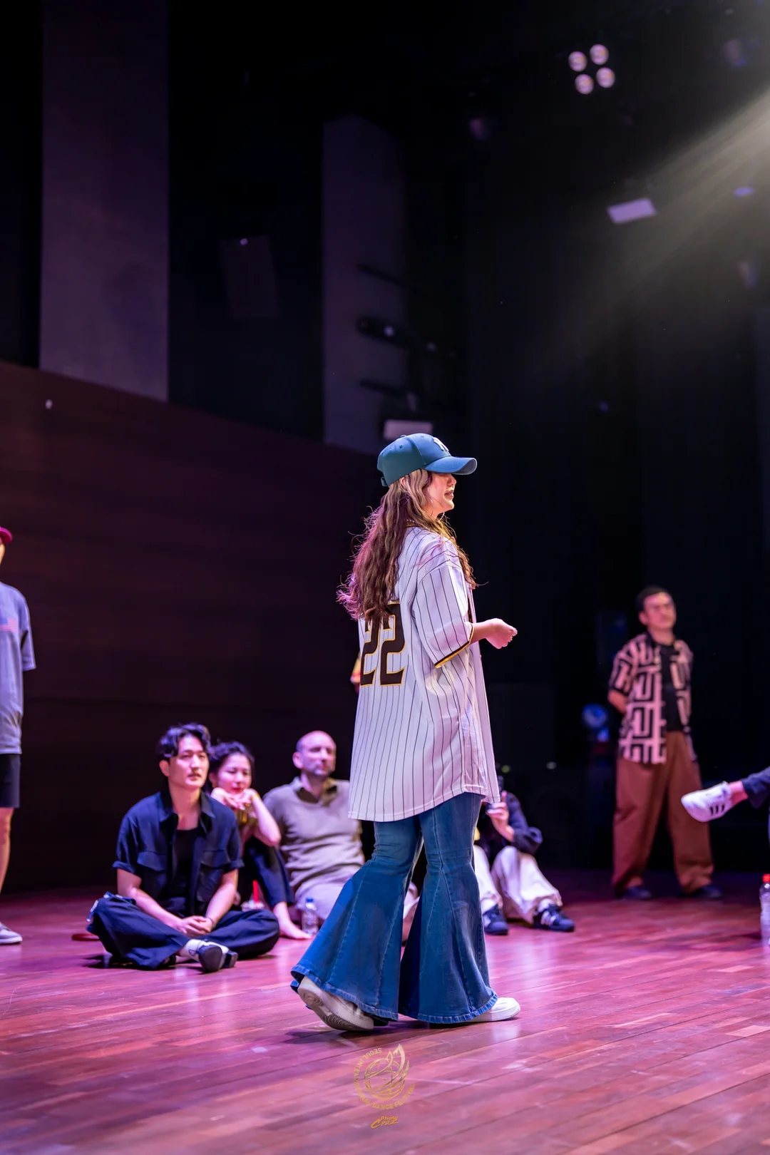 Spectators surrounding the floor and watching a dancer at the SIDF 2026 THE SAUCE battle